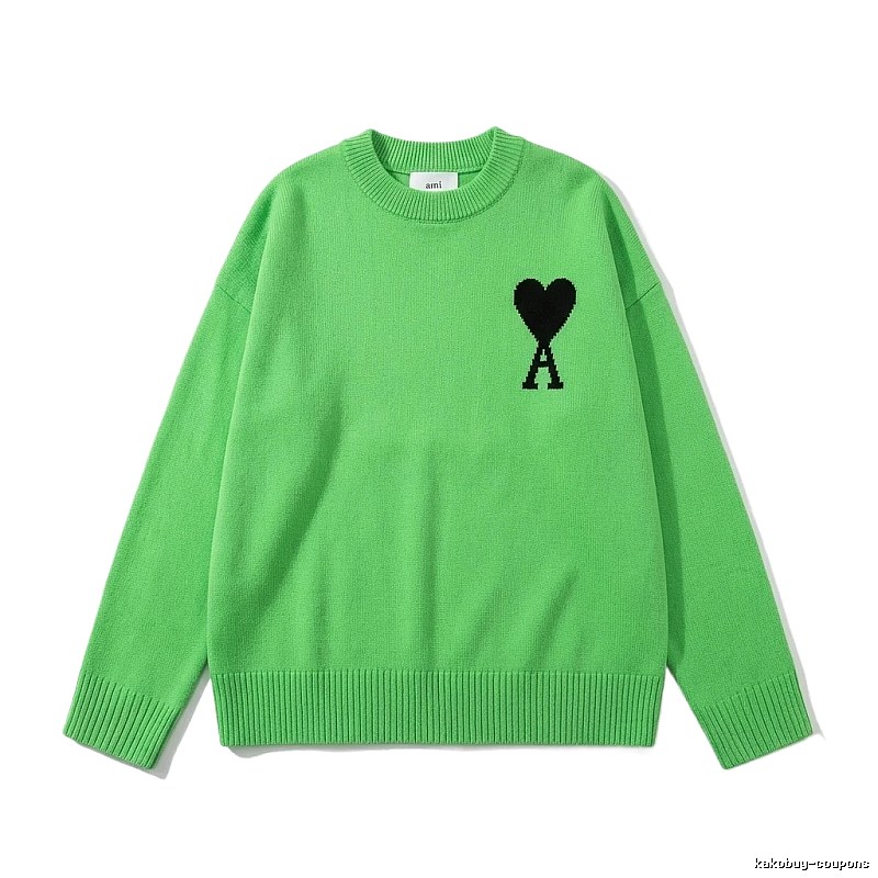 AMIRI's trendy and cool green sweater with a heart pattern.